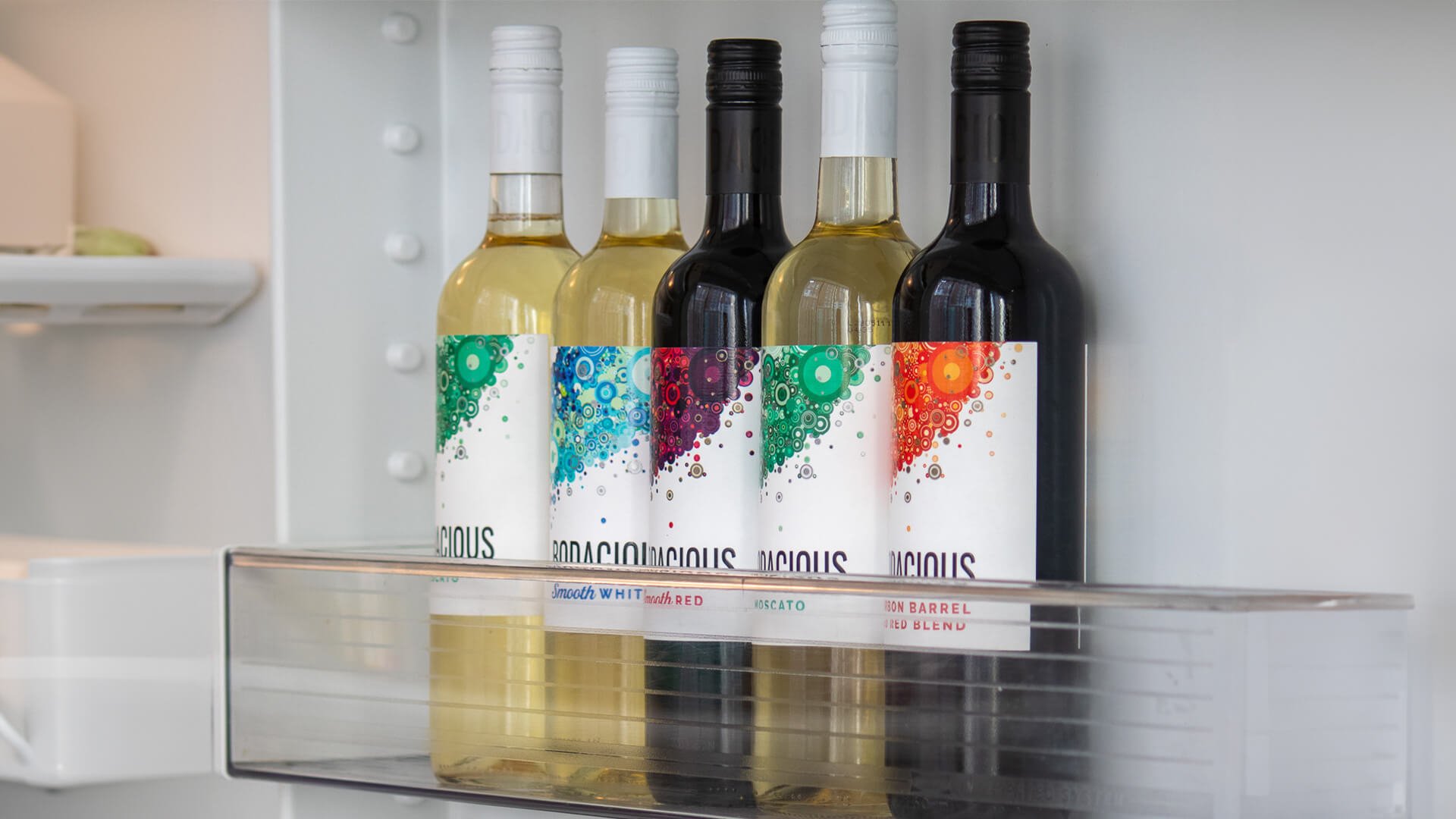 Bottles of Bodacious wine on a shelf.