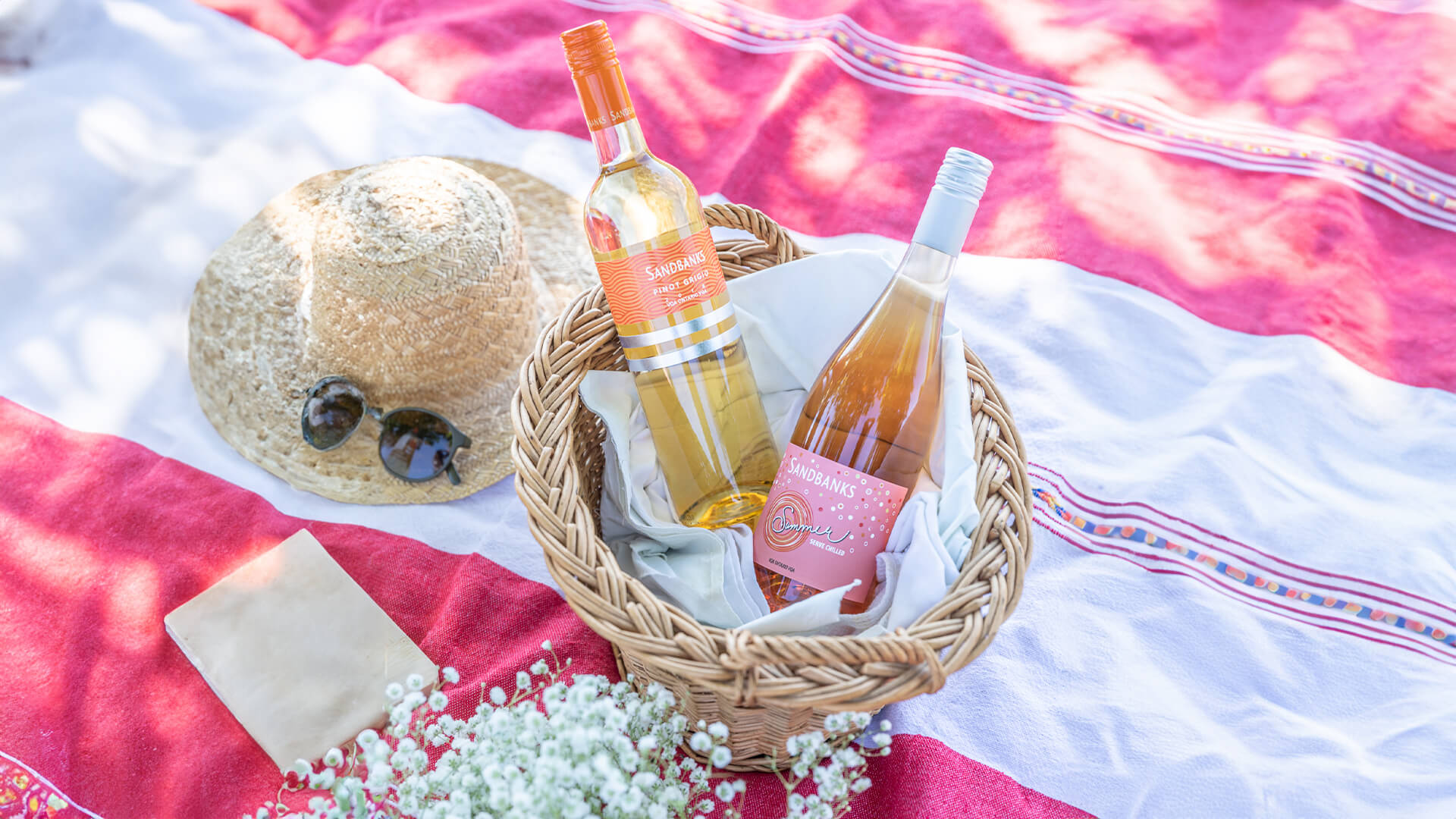 Two bottles of Sandbanks Rose on a picnic.